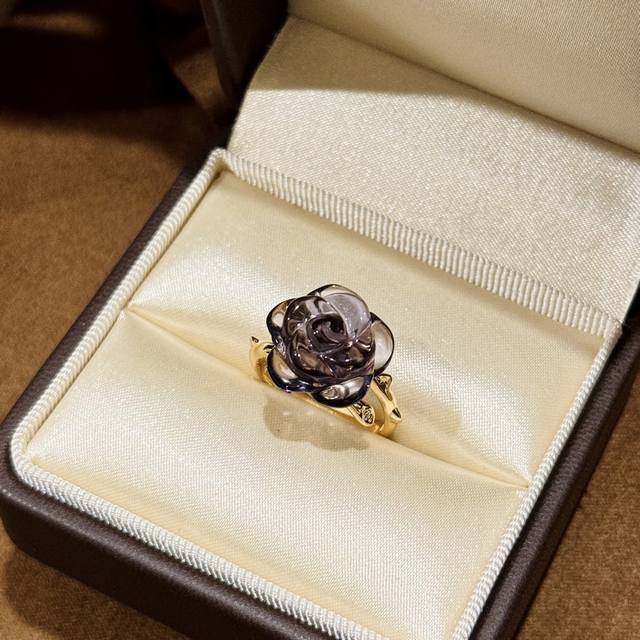 A6121 The new Amethyst Rose Vine Ring from D features a blooming rose bud, a pro