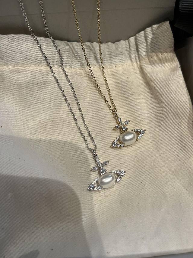 Queen Mother Saturn Diamond Necklace Vivienne Westwood is a British fashion des