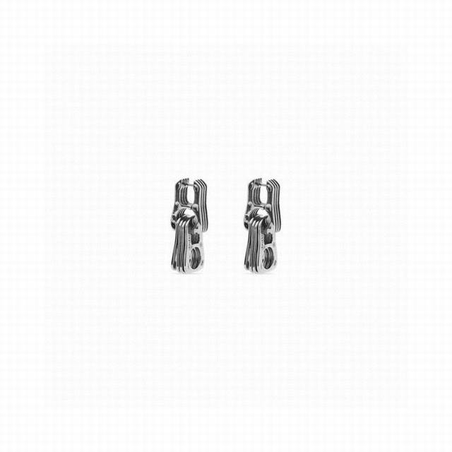 Balenciaga earrings are simple and elegant. The brand's gold texture is full an