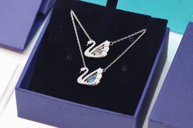 Swarovski White Diamond Blue Diamond Swan Heart Lock Necklace This piece is the