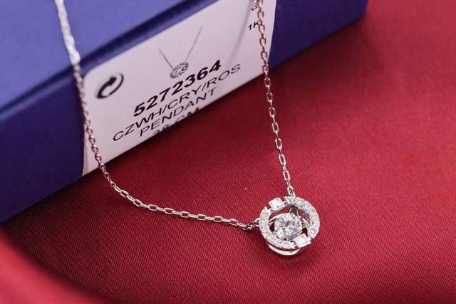 Swarovski White Gold Beating Heart Clavicle Necklace This elegant and charming s