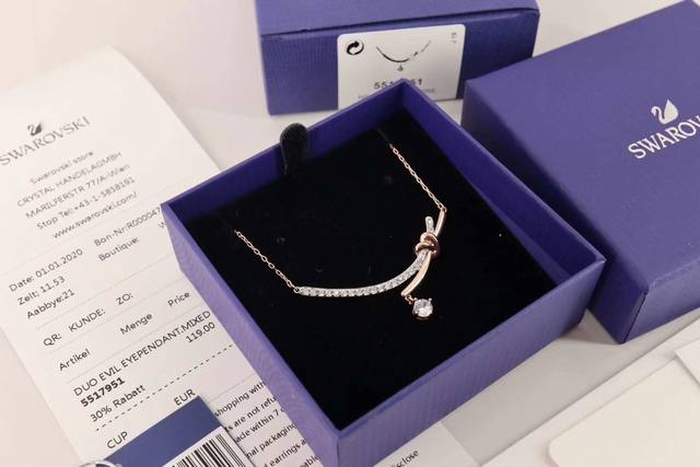 Swarovski Rose and White Color Twisted Collarbone Necklace This sparkling and ch