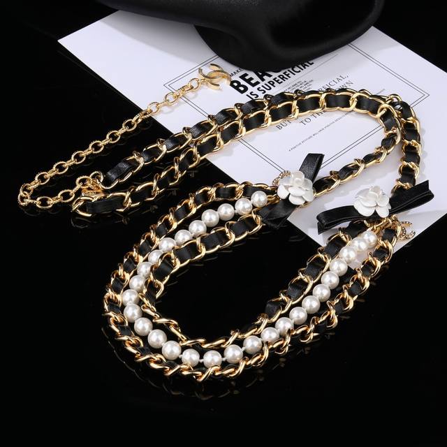 Chanel Camellia waist chain is made of lambskin and is made of the same brass as