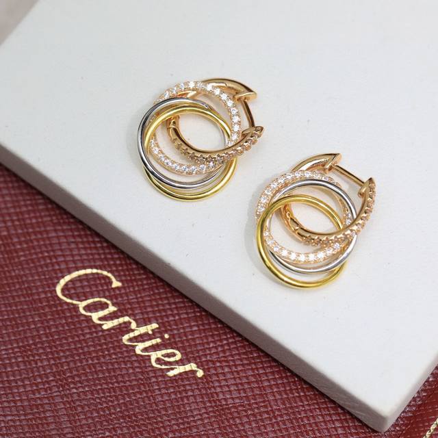 Cartier white diamond three-color three-ring earrings, sub-gold material, exquis