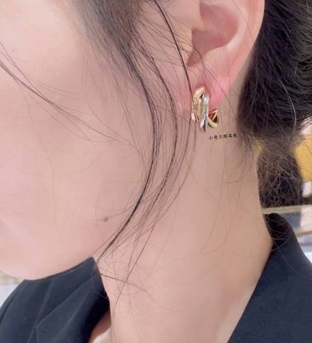 V Gold Cartier small three-ring earrings, another classic, the encircling inlay
