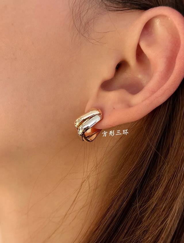 V Gold Cartier small square three-ring earrings are another classic. The encircl