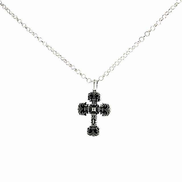 Chloe Heart Mini Flame Cross Necklace The small version has an exclusive oxidat
