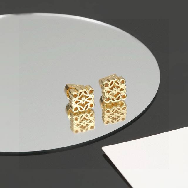 L0Ewe Loewe earrings, and a ring buckle with a Loewe carved diamond buckle, exqu