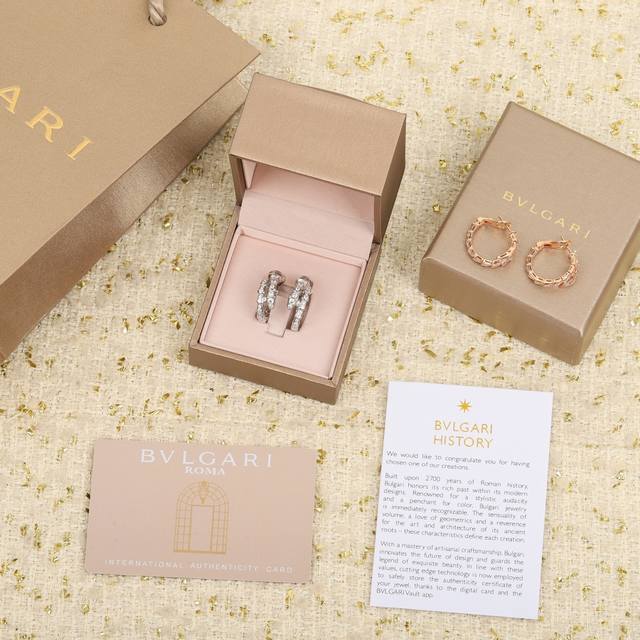 We produce snake-shaped earrings, which can be customized with real gold and re