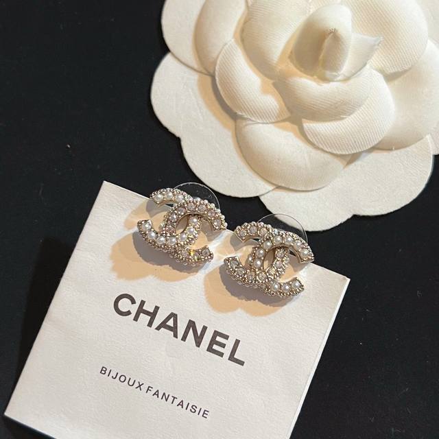 Chanel Swarovski rice beads, black and white diamonds, pearl earrings, a very c