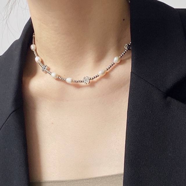 Chanel's latest natural freshwater pearl necklace is made of stainless steel an