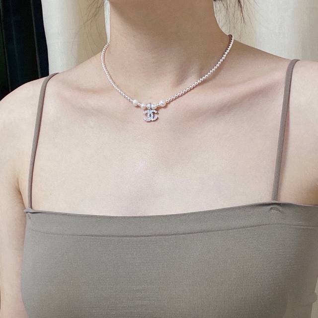 Chanel's latest necklace has irregular natural freshwater pearls and is very uni