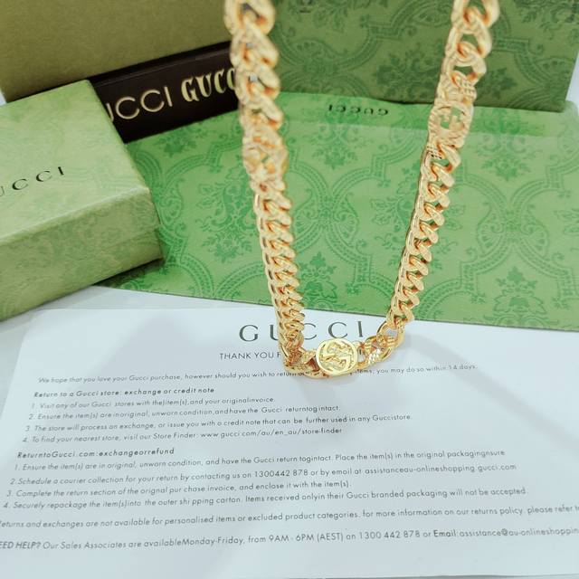 GucciThis curb chain necklace is made of gold with a modern look. The interlocki