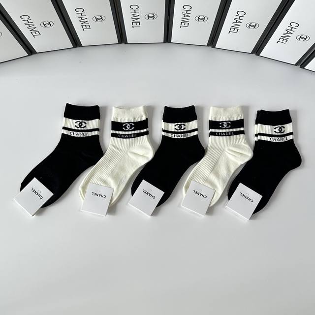Special packaging for Chanel's new classic mid-length stacked socks! Five pairs