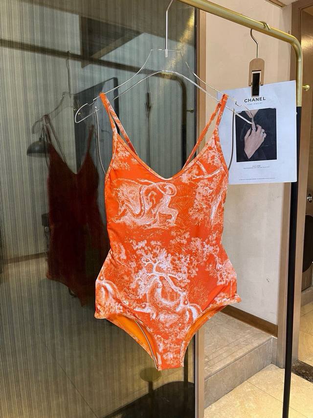 Dior one-piece swimsuit highly recommended! The ultra-chic animal print adds a f