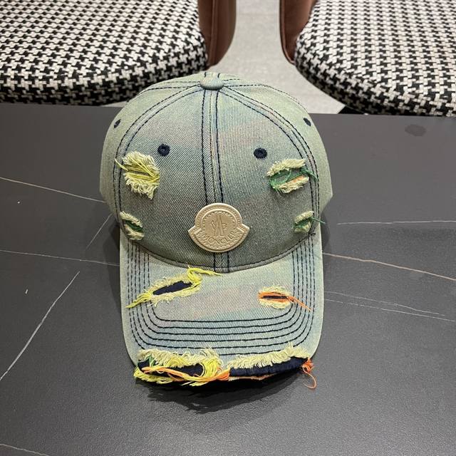 Moncler's new ripped denim baseball cap is full of texture. This year's ripped d