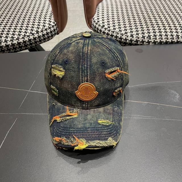 Moncler's new ripped denim baseball cap is full of texture. This year's ripped d