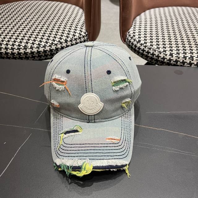 Moncler's new ripped denim baseball cap is full of texture. This year's ripped d