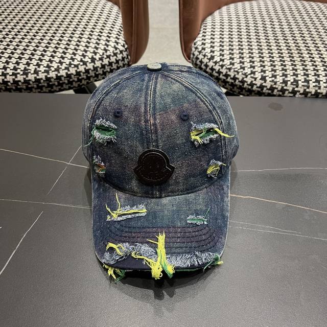 Moncler's new ripped denim baseball cap is full of texture. This year's ripped d