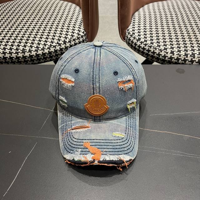 Moncler's new ripped denim baseball cap is full of texture. This year's ripped d