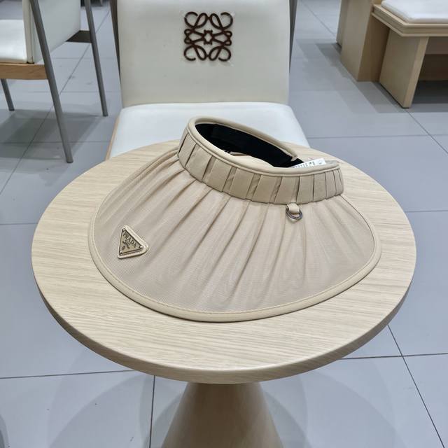 Prada Prada summer new large brim hollow top hat women's outdoor travel pleated