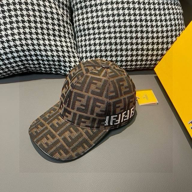 comes with a box bag. This new Fendi baseball cap features a double F jacquard p