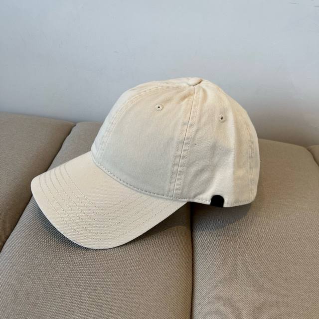 Balenciaga's new logo baseball cap in a cool colorway, perfect for both men and