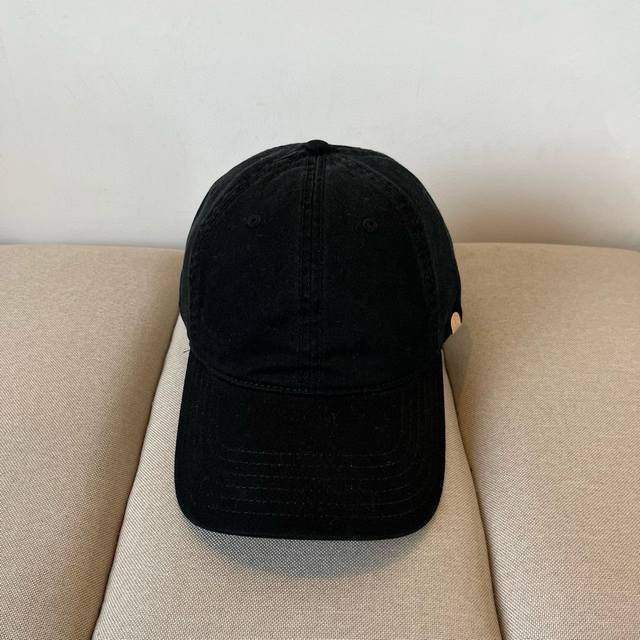 Balenciaga's new logo baseball cap in a cool colorway, perfect for both men and