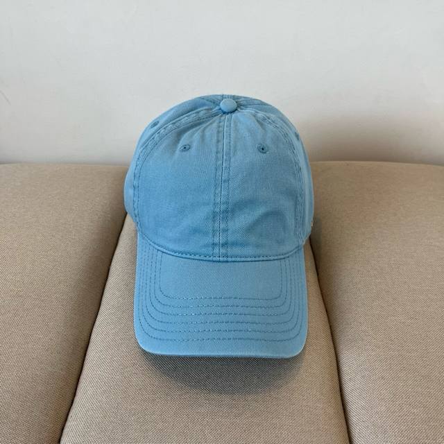 Balenciaga's new logo baseball cap in a cool colorway, perfect for both men and