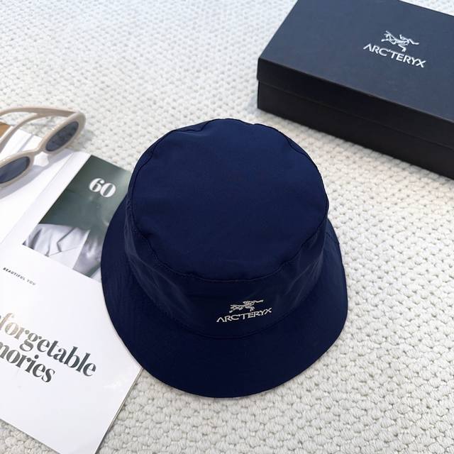 Arcteryx's new embroidered bucket hat is now available. It's a must-have for tre