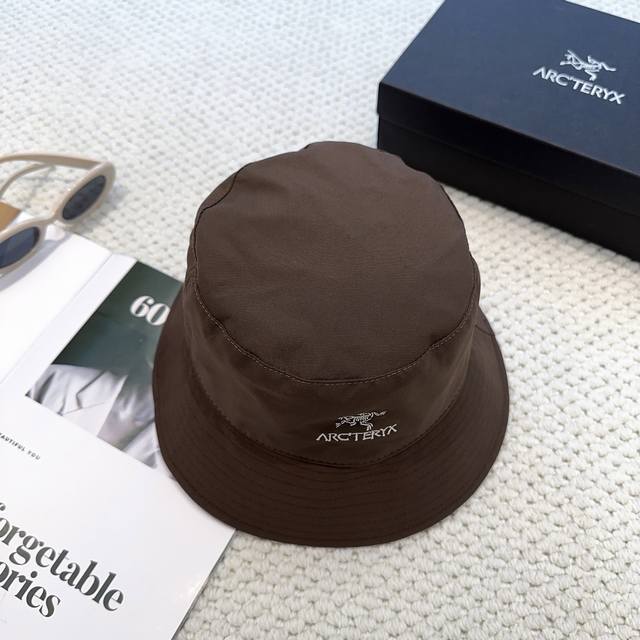 Arcteryx's new embroidered bucket hat is now available. It's a must-have for tre