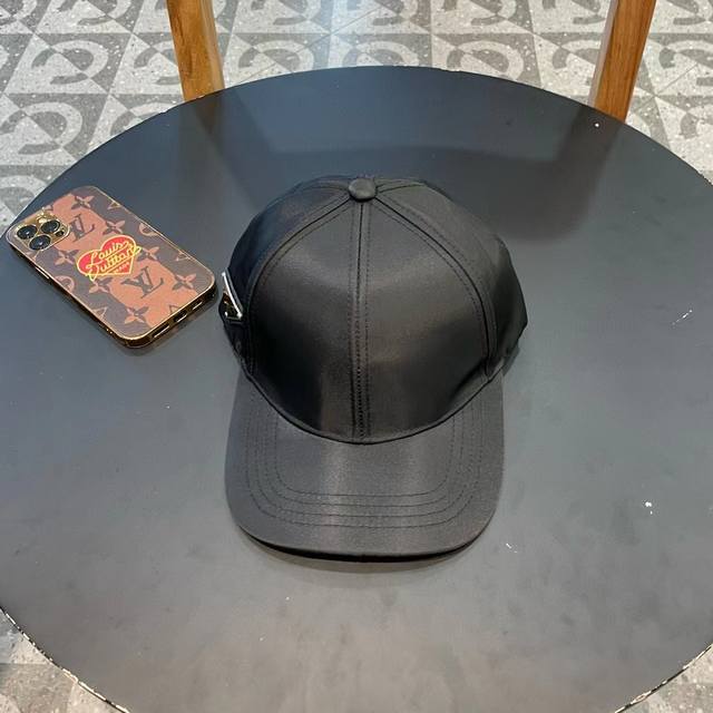 Prada classic triangle logo baseball cap is a must-have and will look great anyt