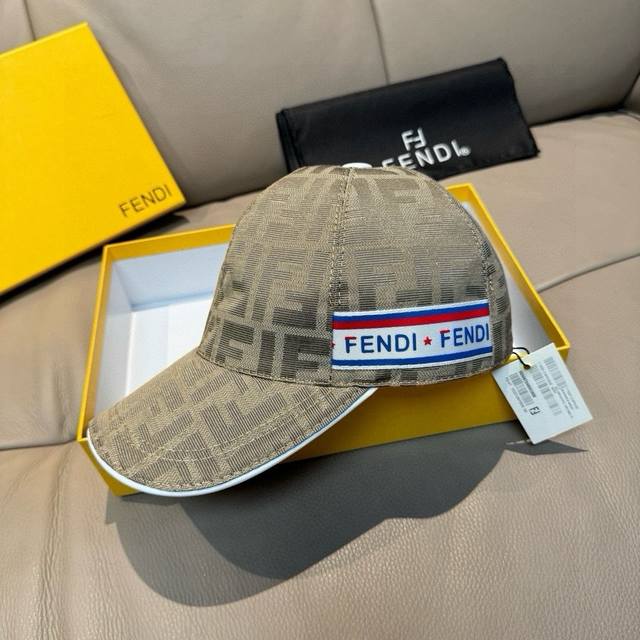 comes with a box bag. This new Fendi baseball cap features a double F jacquard p