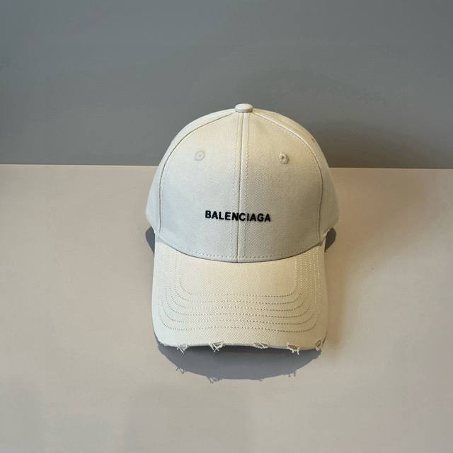 Balenciaga's new logo baseball cap in a cool colorway, perfect for both men and