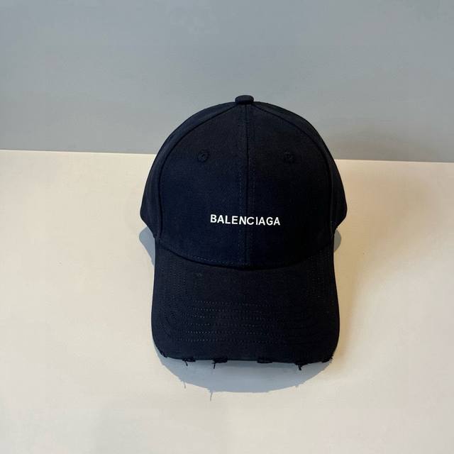 Balenciaga's new logo baseball cap in a cool colorway, perfect for both men and