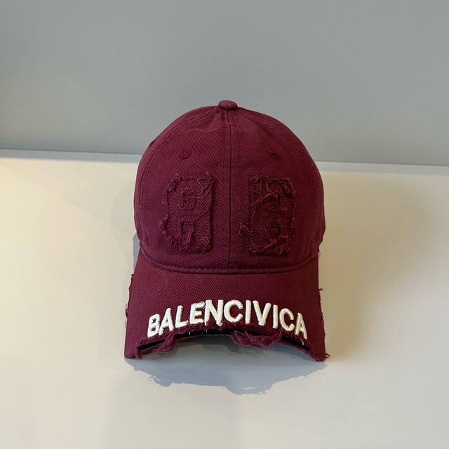 Balenciaga's new logo baseball cap in a cool colorway, perfect for both men and