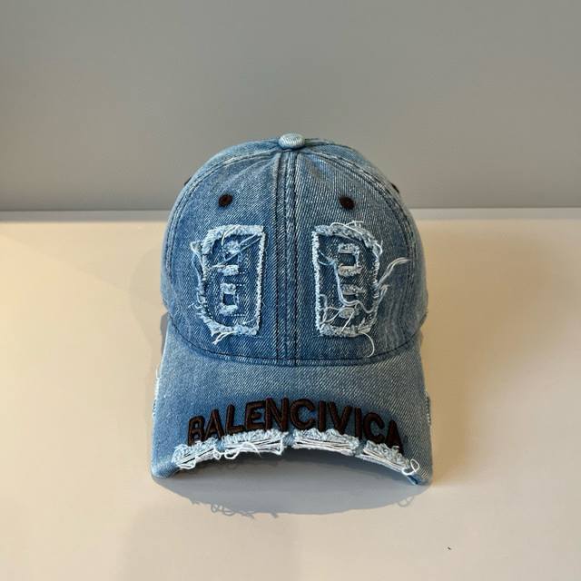 Balenciaga's new logo baseball cap in a cool colorway, perfect for both men and