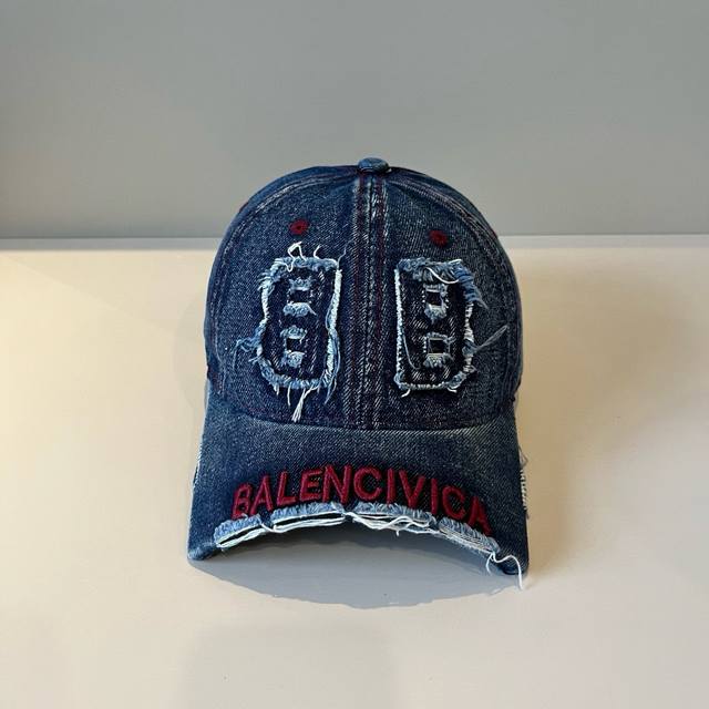 Balenciaga's new logo baseball cap in a cool colorway, perfect for both men and