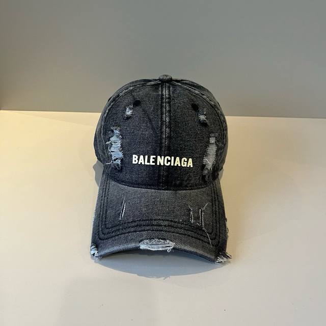 Balenciaga's new logo baseball cap in a cool colorway, perfect for both men and