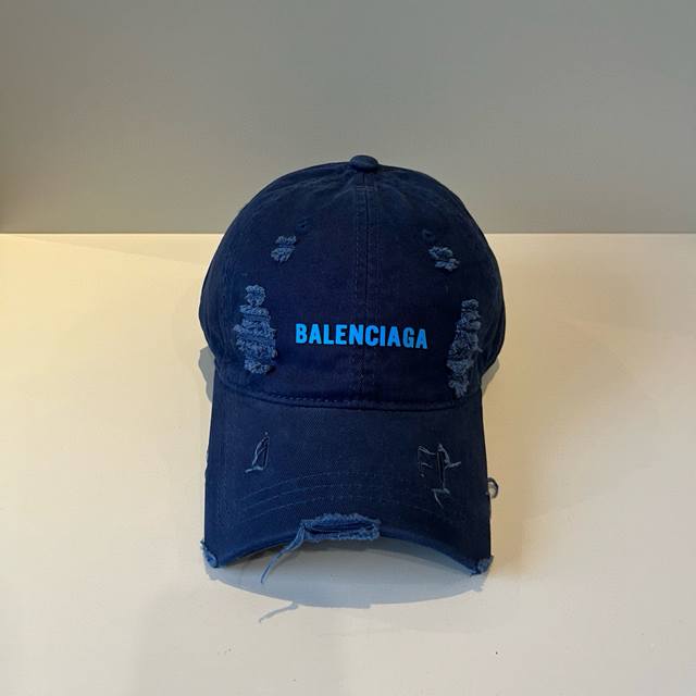 Balenciaga's new logo baseball cap in a cool colorway, perfect for both men and