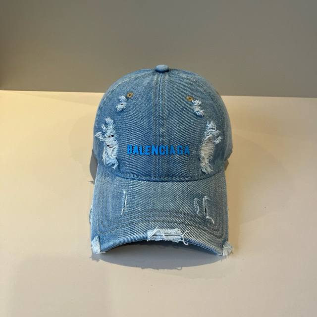 Balenciaga's new logo baseball cap in a cool colorway, perfect for both men and