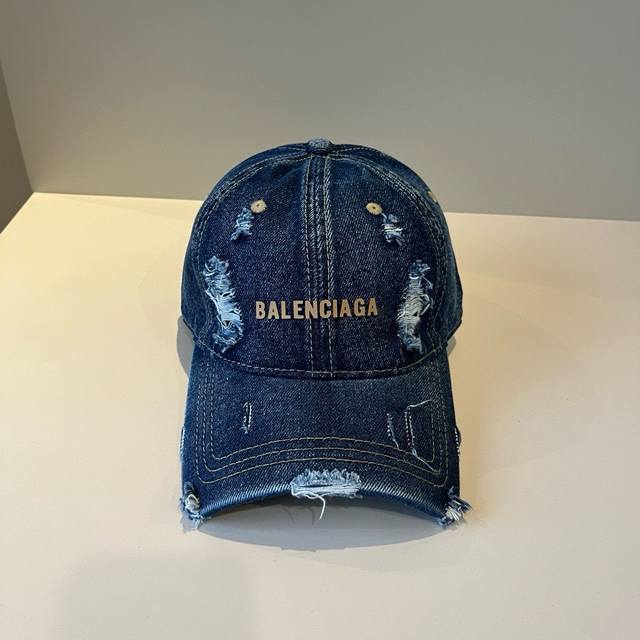 Balenciaga's new logo baseball cap in a cool colorway, perfect for both men and