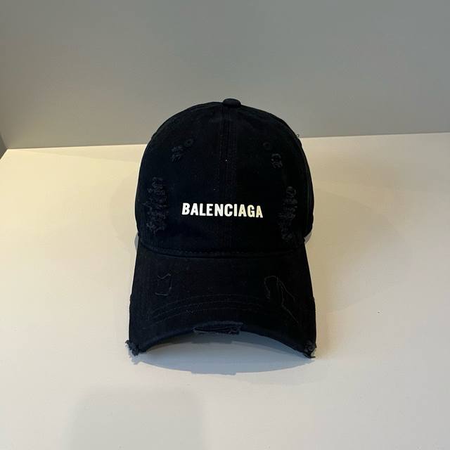 Balenciaga's new logo baseball cap in a cool colorway, perfect for both men and