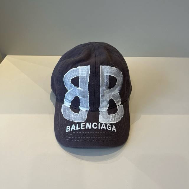 Balenciaga's new logo baseball cap in a cool colorway, perfect for both men and