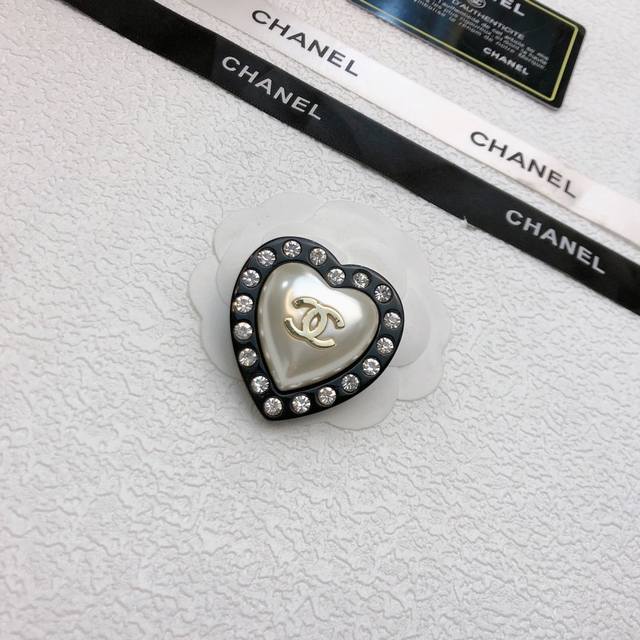 Chanel resin brooch. Sometimes simplicity doesn't necessarily mean ordinary. Thi