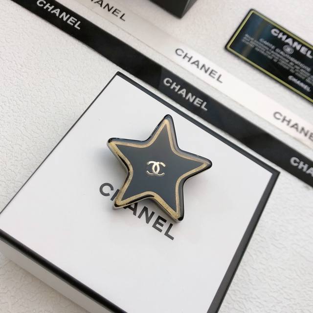 Chanel resin brooch Brooch. Sometimes simplicity doesn't necessarily mean ordina
