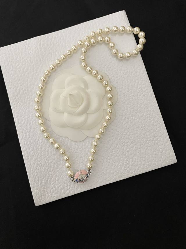 Pink, gold, and black necklace. Vivienne Westwood Lisa's matching bracelet, 1000