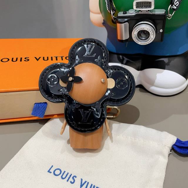 Louis Vuitton's new bag charms and keychains. LV Vivian sunflower bag charms and