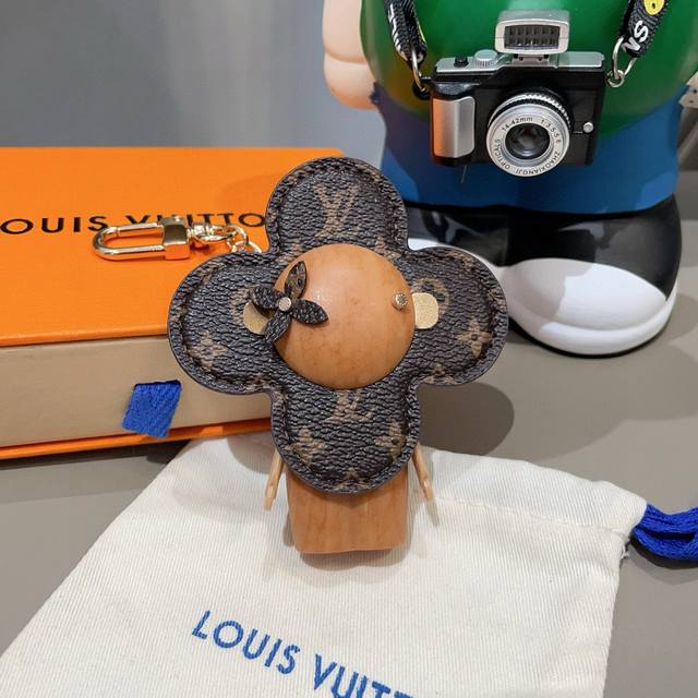 Louis Vuitton's new bag charms and keychains. LV Vivian sunflower bag charms and