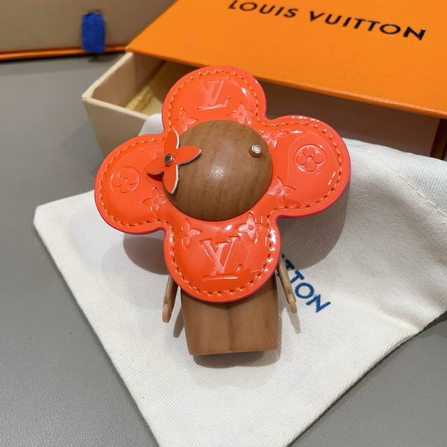 Louis Vuitton's new bag charms and keychains. LV Vivian sunflower bag charms and